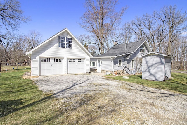 exterior space featuring an outbuilding, a chimney, and a yard
