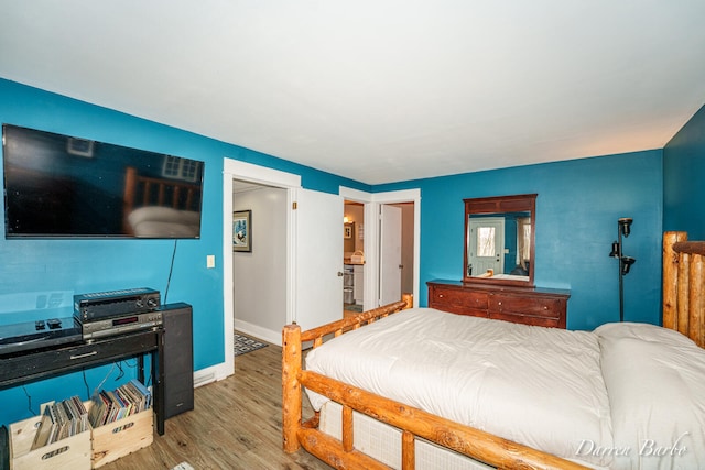 3770 Pine Ln, Saranac, MI 48881 - bedroom with wood finished floors and baseboards