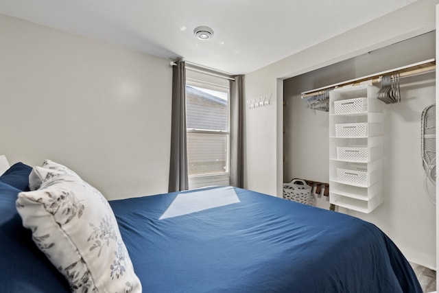 bedroom featuring wood finished floors