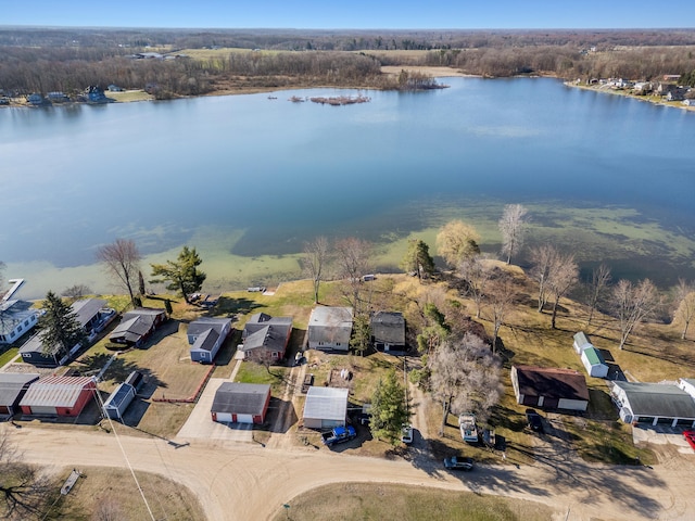 birds eye view of property featuring a water view and a residential view