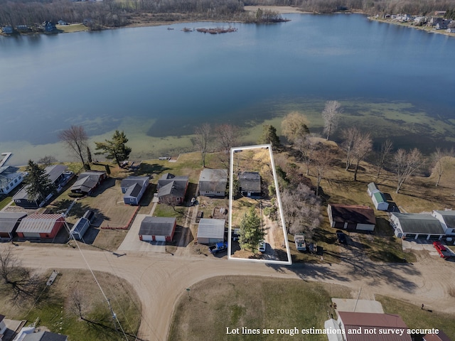 bird's eye view featuring a water view and a residential view