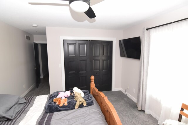 28 Hunting Trail Ave, Quincy, MI 49082 - carpeted bedroom with baseboards, visible vents, a closet, and a ceiling fan