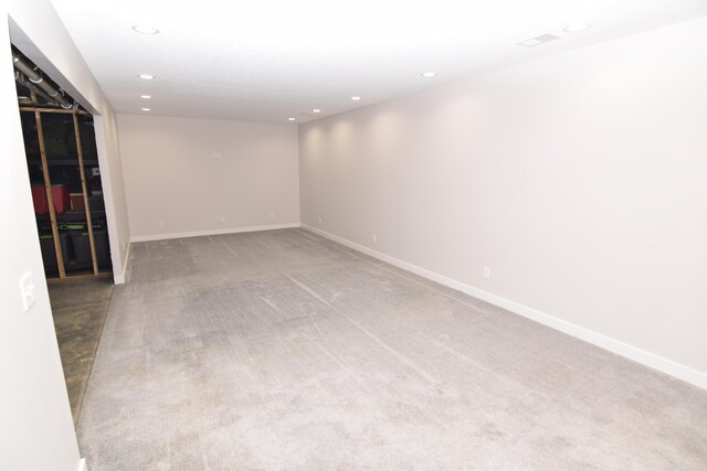 28 Hunting Trail Ave, Quincy, MI 49082 - carpeted spare room with baseboards and recessed lighting