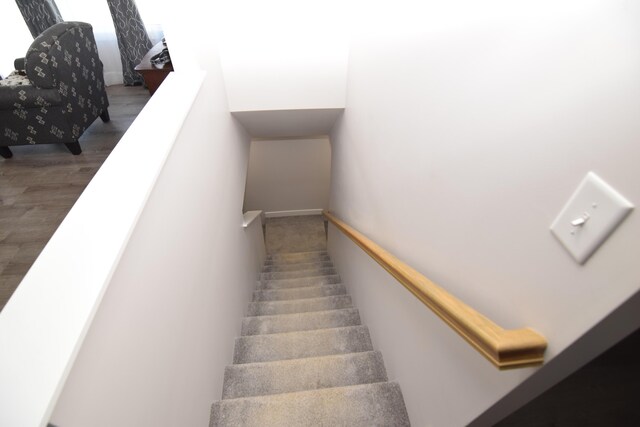 28 Hunting Trail Ave, Quincy, MI 49082 - stairway featuring wood finished floors
