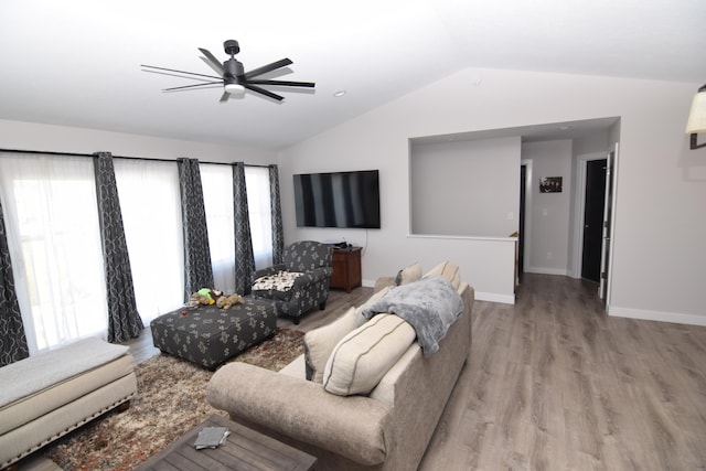28 Hunting Trail Ave, Quincy, MI 49082 - living room with baseboards, vaulted ceiling, wood finished floors, and a ceiling fan