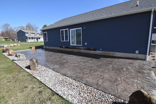 28 Hunting Trail Ave, Quincy, MI 49082 - view of side of home with a lawn and a patio area
