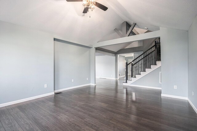 101 E 4th St, Buchanan, MI 49107 - unfurnished living room with baseboards, wood finished floors, stairway, and a ceiling fan