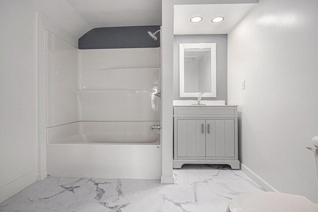 101 E 4th St, Buchanan, MI 49107 - full bath featuring toilet, vanity, shower / tub combination, marble finish floor, and baseboards