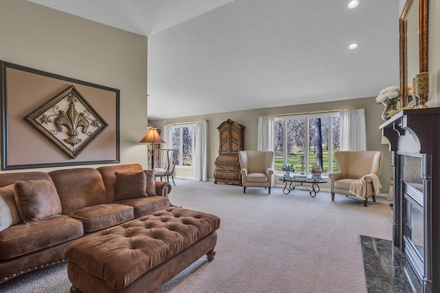 4284 Fairway Ln, Jackson, MI 49201 - living area with baseboards, a high end fireplace, carpet floors, recessed lighting, and vaulted ceiling
