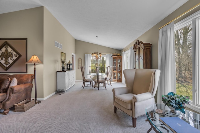 4284 Fairway Ln, Jackson, MI 49201 - living area with an inviting chandelier, visible vents, carpet flooring, and plenty of natural light