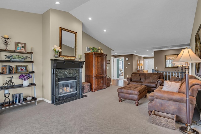 4284 Fairway Ln, Jackson, MI 49201 - carpeted living room with a tiled fireplace, baseboards, recessed lighting, and high vaulted ceiling