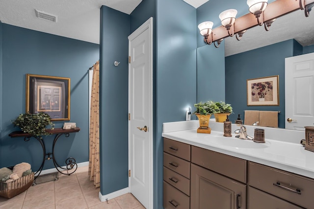 4284 Fairway Ln, Jackson, MI 49201 - full bathroom featuring vanity, baseboards, a chandelier, tile patterned floors, and visible vents