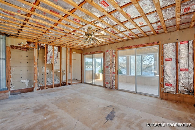 misc room featuring unfinished concrete flooring