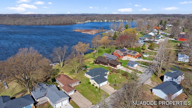 birds eye view of property featuring a residential view and a water view