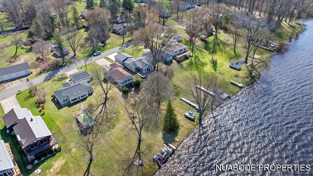 aerial view featuring a residential view and a water view