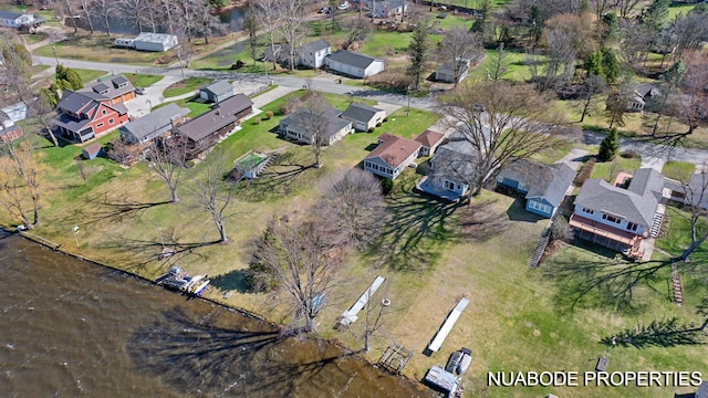 aerial view featuring a residential view and a water view