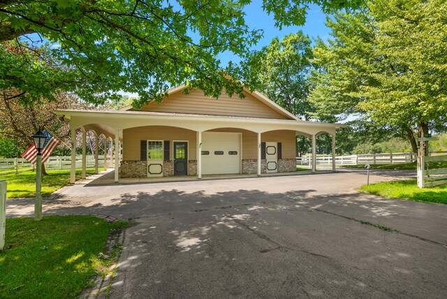 6130 Eidson Rd, Saint Joseph, MI 49085 - surrounding community featuring a garage and driveway