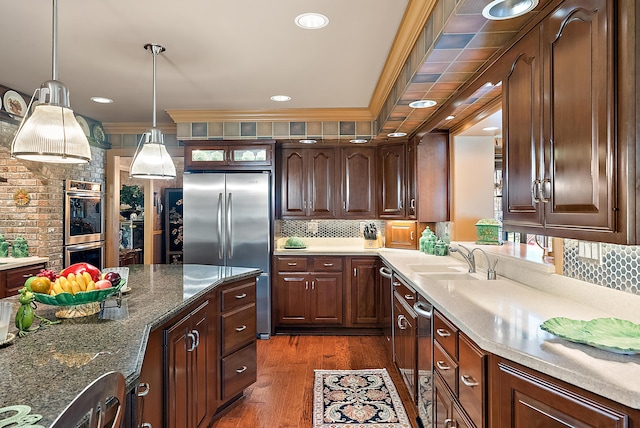 6130 Eidson Rd, Saint Joseph, MI 49085 - kitchen with stainless steel appliances, a sink, tasteful backsplash, dark wood finished floors, and glass insert cabinets