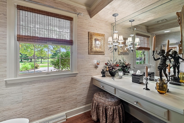 6130 Eidson Rd, Saint Joseph, MI 49085 - bathroom featuring wood finished floors, a chandelier, and baseboards