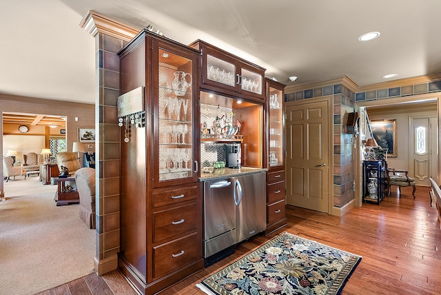 6130 Eidson Rd, Saint Joseph, MI 49085 - indoor bar with ornamental molding, hardwood / wood-style flooring, recessed lighting, and fridge