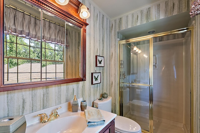 6130 Eidson Rd, Saint Joseph, MI 49085 - bathroom with wallpapered walls, vanity, a shower stall, toilet, and ornamental molding
