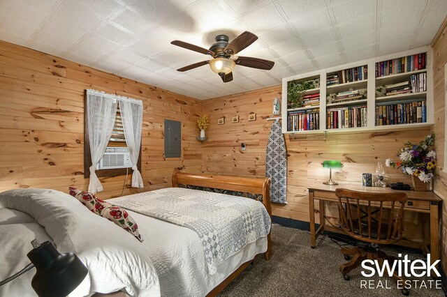 14194 Hicks Lake Rd, Evart, MI 49631 - bedroom with wooden walls, a ceiling fan, carpet flooring, and electric panel
