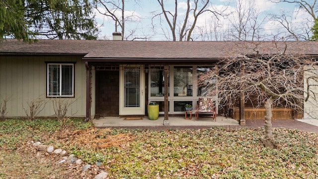 1506 Hillridge Blvd, Ann Arbor, MI 48103 - view of front of property with a chimney and roof with shingles