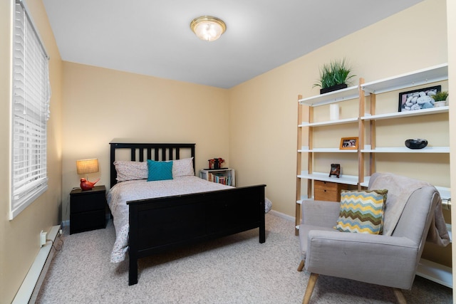 1506 Hillridge Blvd, Ann Arbor, MI 48103 - bedroom with baseboard heating, baseboards, and carpet floors