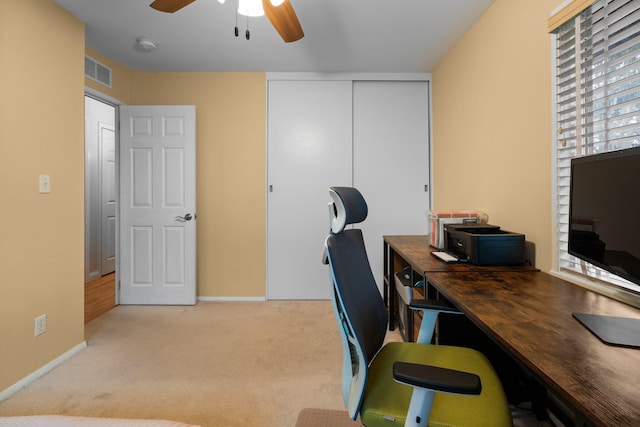 1506 Hillridge Blvd, Ann Arbor, MI 48103 - office area featuring visible vents, ceiling fan, light colored carpet, and baseboards
