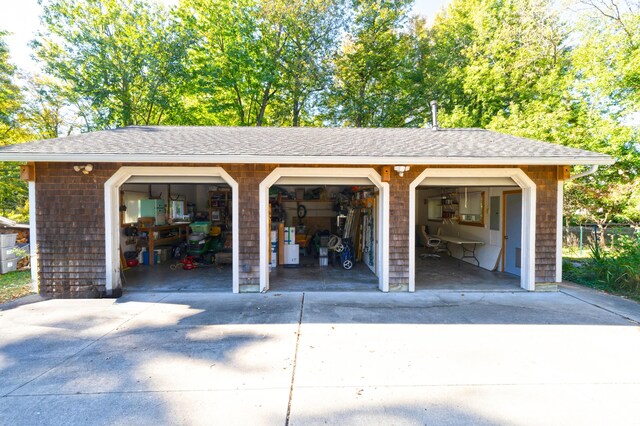 306 Eubank St, Novi, MI 48377 - garage featuring concrete driveway