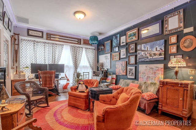 234 Madison Ave SE, Grand Rapids, MI 49503 - living area featuring visible vents and wood finished floors