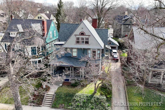 234 Madison Ave SE, Grand Rapids, MI 49503 - view of front facade with stairway and a chimney
