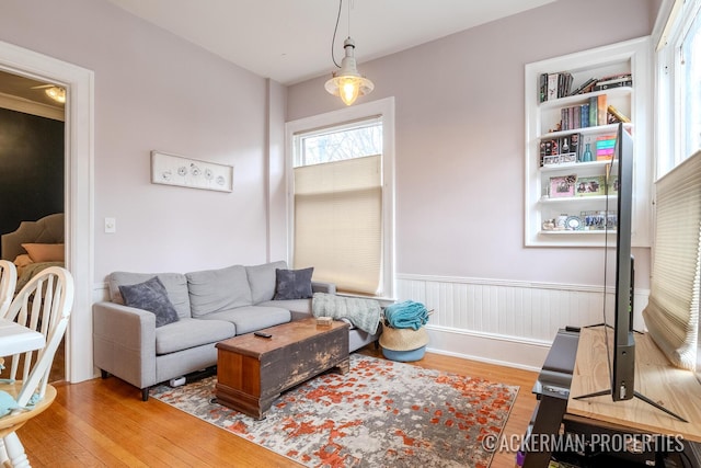 234 Madison Ave SE, Grand Rapids, MI 49503 - living area with wood finished floors and wainscoting