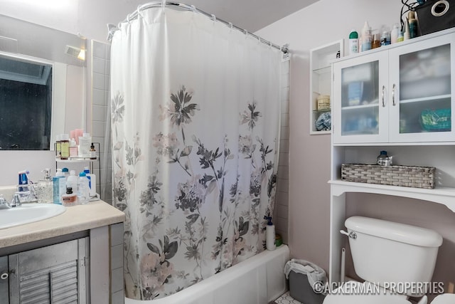 234 Madison Ave SE, Grand Rapids, MI 49503 - full bath with toilet, shower / tub combo, vanity, and visible vents