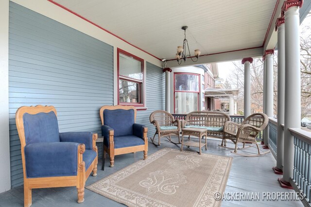 234 Madison Ave SE, Grand Rapids, MI 49503 - sunroom / solarium with a chandelier