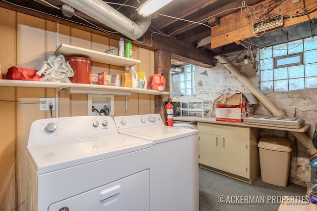 234 Madison Ave SE, Grand Rapids, MI 49503 - laundry area with cabinet space and washer and clothes dryer