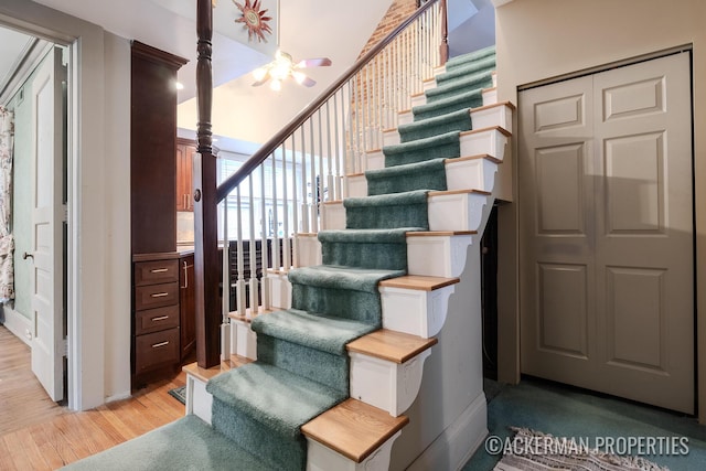 234 Madison Ave SE, Grand Rapids, MI 49503 - stairway with a ceiling fan and wood finished floors