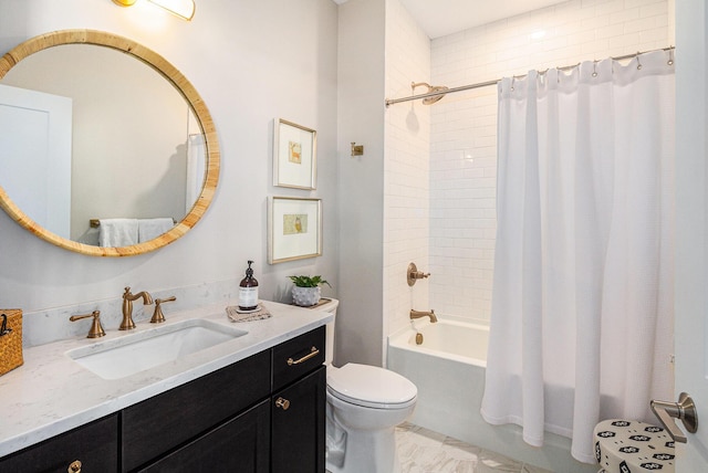 bathroom with shower / bath combo with shower curtain, vanity, and toilet