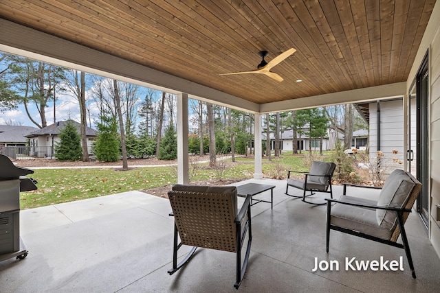 view of patio featuring ceiling fan