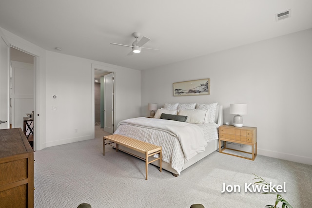 bedroom with carpet, visible vents, and baseboards
