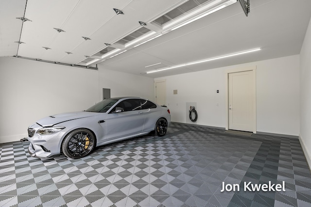 garage with baseboards