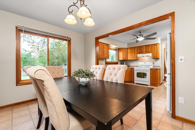 1569 Sheffield Dr, Ypsilanti, MI 48198 - dining room with baseboards, a chandelier, and a ceiling fan