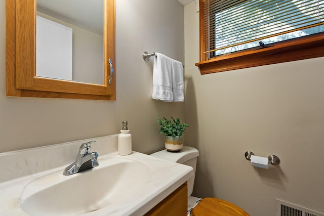 1569 Sheffield Dr, Ypsilanti, MI 48198 - half bathroom with toilet and vanity