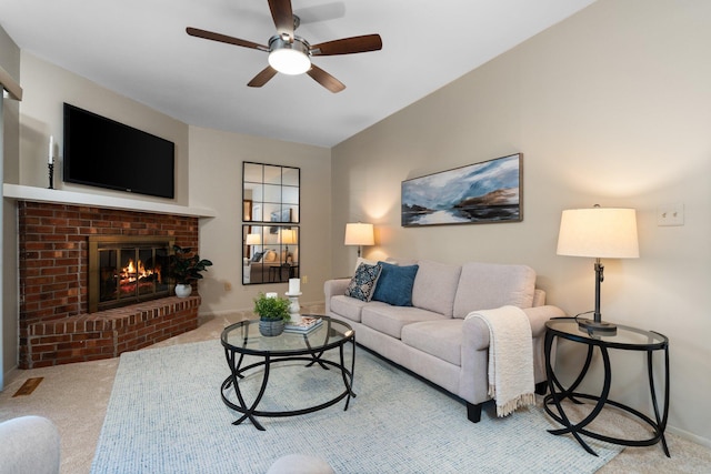 1569 Sheffield Dr, Ypsilanti, MI 48198 - carpeted living room with a ceiling fan, a brick fireplace, and baseboards