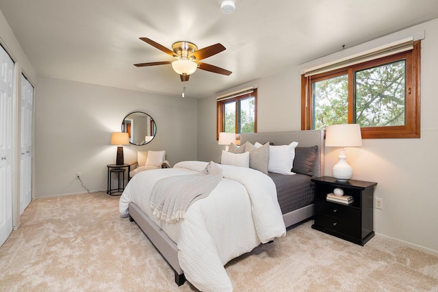 1569 Sheffield Dr, Ypsilanti, MI 48198 - bedroom with light carpet, baseboards, and a ceiling fan