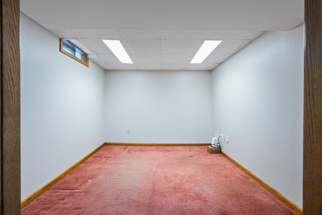 1569 Sheffield Dr, Ypsilanti, MI 48198 - carpeted empty room featuring a paneled ceiling and baseboards