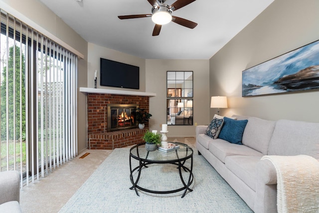 1569 Sheffield Dr, Ypsilanti, MI 48198 - living room featuring ceiling fan, a fireplace, and carpet