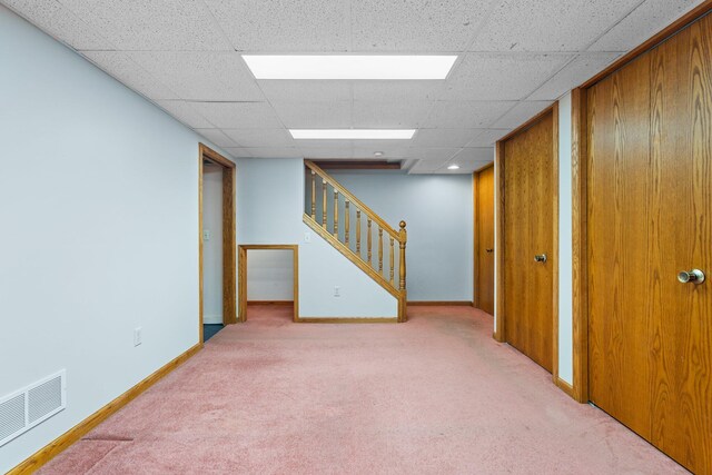 1569 Sheffield Dr, Ypsilanti, MI 48198 - finished basement featuring carpet flooring, stairs, baseboards, and a paneled ceiling