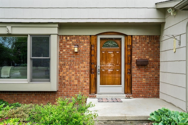 1569 Sheffield Dr, Ypsilanti, MI 48198 - doorway to property with brick siding