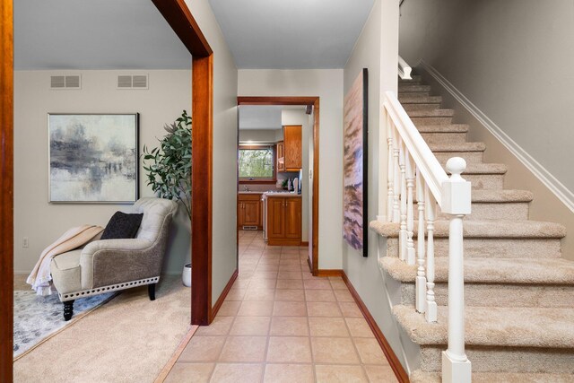 1569 Sheffield Dr, Ypsilanti, MI 48198 - stairs featuring baseboards